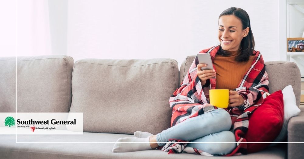 Woman viewing her mobile phone